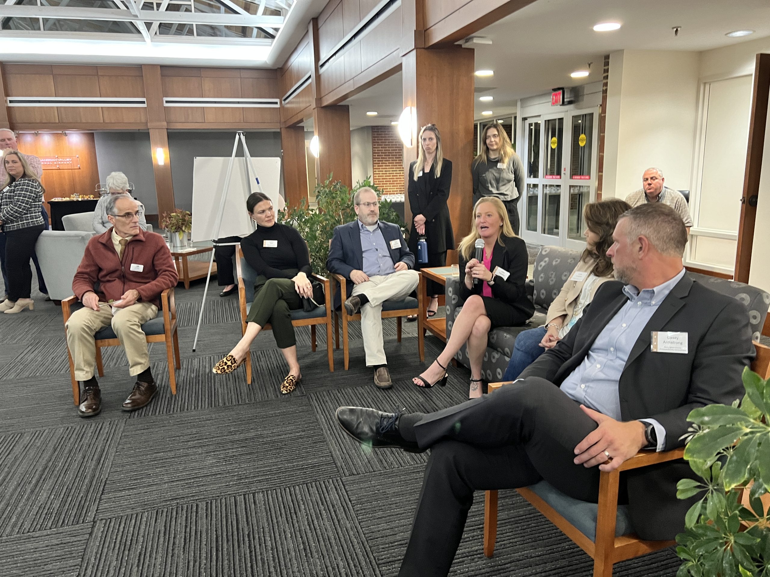 People sitting in chairs talking